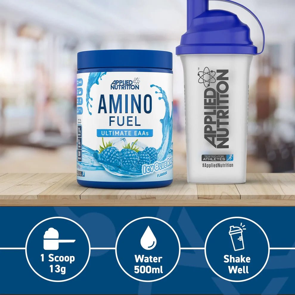 Applied Nutrition Amino Fuel container and shaker bottle on a wooden surface with a blurred background.